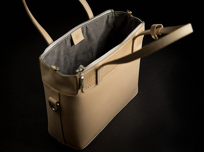 硬轨手工皮具手提包 匠心独运的零售魅力